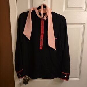 Black Shirt with Red Accents and Pink Scarf